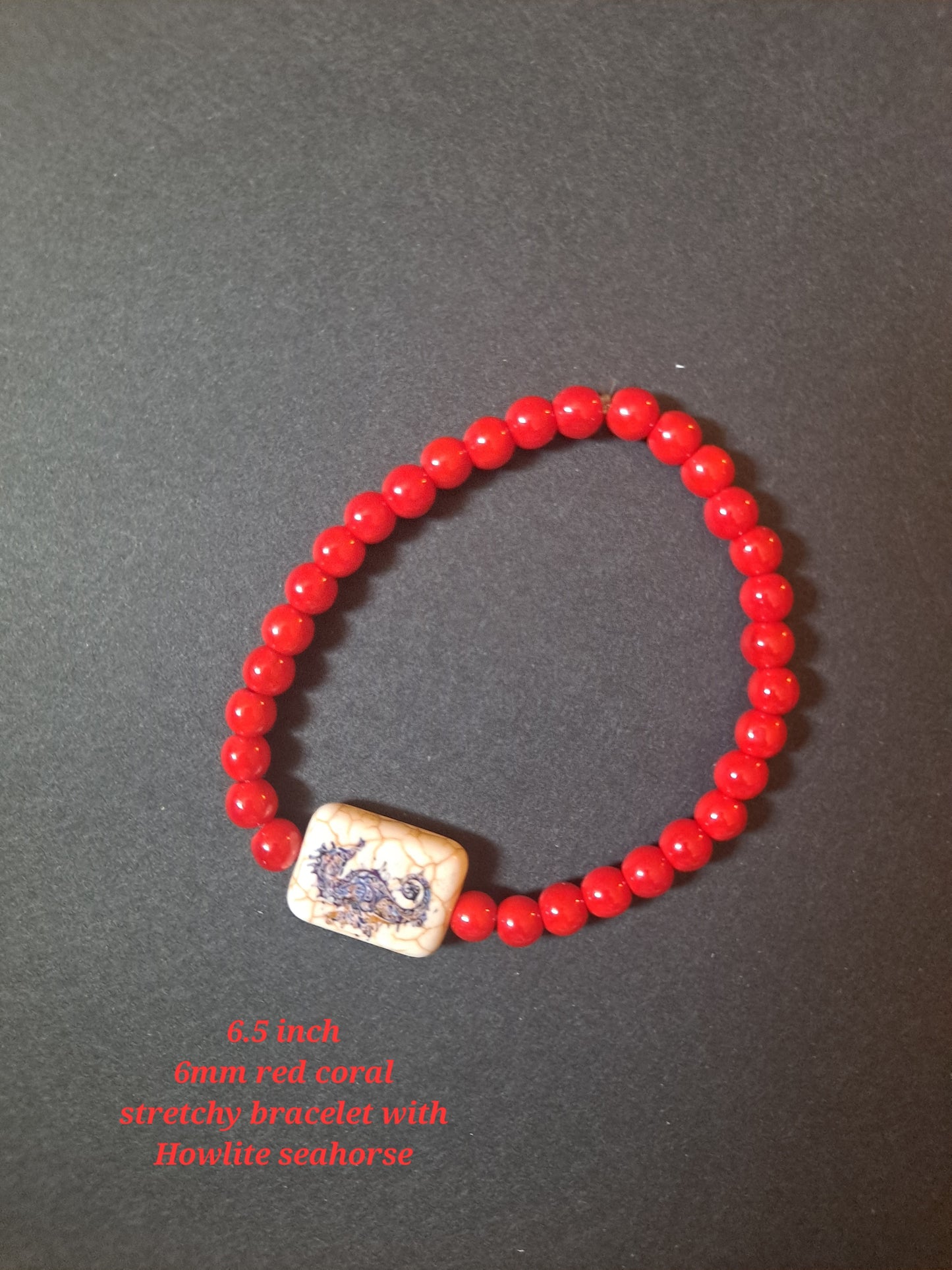Red Coral Stretchy Bracelet with Howlite Seahorse